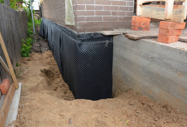 Happy homeowners after waterproofing job in Thorsby